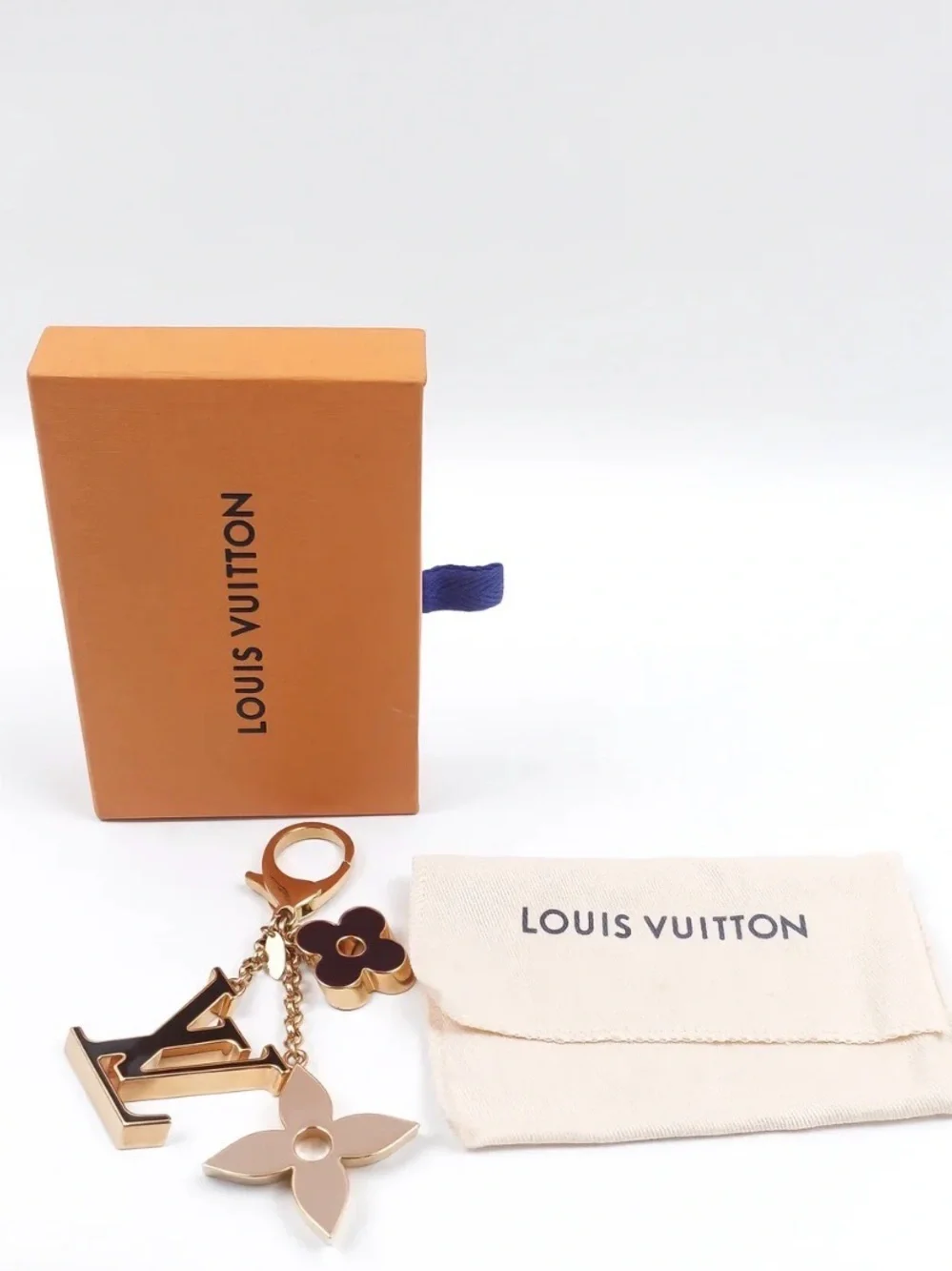 Pre owned Louis Vuitton Gold and Brown Flower Key Charm with Cream Accent